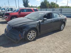 Salvage cars for sale from Copart Miami, FL: 2015 Ford Fusion SE