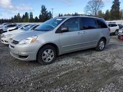 Salvage cars for sale from Copart Graham, WA: 2005 Toyota Sienna CE