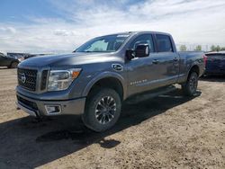 Salvage cars for sale from Copart Rocky View County, AB: 2016 Nissan Titan XD SL