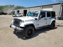 Salvage cars for sale at West Mifflin, PA auction: 2013 Jeep Wrangler Unlimited Sahara