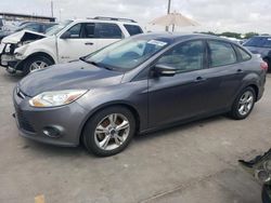 Salvage cars for sale from Copart Grand Prairie, TX: 2014 Ford Focus SE