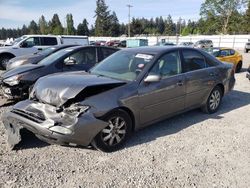 Salvage cars for sale at Graham, WA auction: 2004 Toyota Camry LE