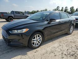 Salvage cars for sale at Houston, TX auction: 2014 Ford Fusion SE