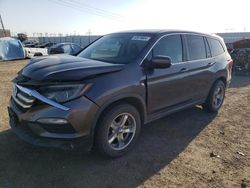 Salvage cars for sale from Copart Adelanto, CA: 2017 Honda Pilot EXL