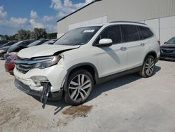 Salvage SUVs for sale at auction: 2017 Honda Pilot Touring