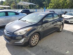 Flood-damaged cars for sale at auction: 2014 Hyundai Elantra SE