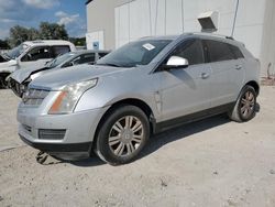 Salvage cars for sale at Apopka, FL auction: 2011 Cadillac SRX Luxury Collection