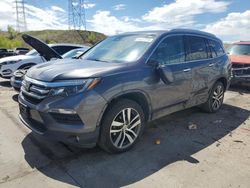 Salvage cars for sale at auction: 2017 Honda Pilot Touring