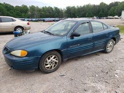 Salvage cars for sale from Copart Charles City, VA: 2002 Pontiac Grand AM SE1