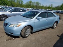 Salvage cars for sale from Copart Marlboro, NY: 2009 Toyota Camry Hybrid