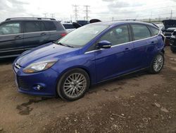 Salvage cars for sale at Elgin, IL auction: 2014 Ford Focus Titanium