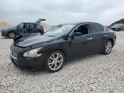 Carros dañados por inundaciones a la venta en subasta: 2014 Nissan Maxima S