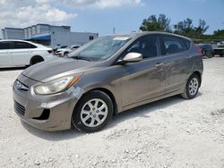 Salvage cars for sale from Copart Opa Locka, FL: 2013 Hyundai Accent GLS