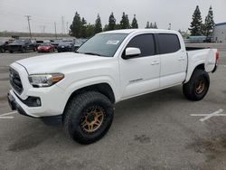 Salvage cars for sale from Copart Rancho Cucamonga, CA: 2017 Toyota Tacoma Double Cab