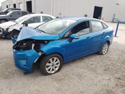 Salvage cars for sale from Copart Jacksonville, FL: 2013 Ford Fiesta SE