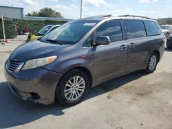 Salvage cars for sale from Copart Orlando, FL: 2011 Toyota Sienna XLE