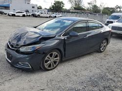 Salvage cars for sale from Copart Opa Locka, FL: 2017 Chevrolet Cruze Premier