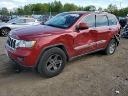 Salvage SUVs for sale at auction: 2011 Jeep Grand Cherokee Laredo