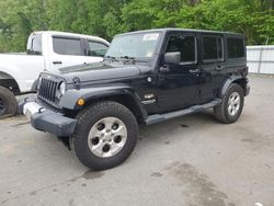 Salvage cars for sale at Glassboro, NJ auction: 2015 Jeep Wrangler Unlimited Sahara