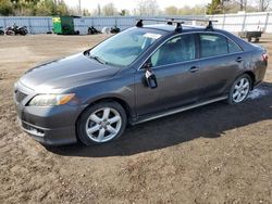 Salvage cars for sale from Copart Ontario Auction, ON: 2009 Toyota Camry Base