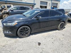 Salvage cars for sale at Earlington, KY auction: 2014 Ford Fusion SE
