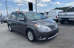 Salvage cars for sale from Copart Orlando, FL: 2012 Toyota Sienna XLE