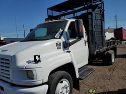 Salvage trucks for sale at Phoenix, AZ auction: 2004 Chevrolet C5500 C5C042