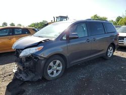 Salvage cars for sale at auction: 2014 Toyota Sienna LE