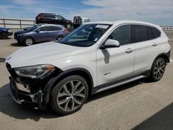 Salvage cars for sale at Fresno, CA auction: 2017 BMW X1 XDRIVE28I