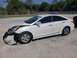 Salvage cars for sale from Copart Fort Pierce, FL: 2012 Hyundai Sonata Hybrid