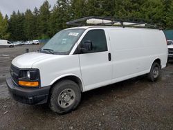 Salvage trucks for sale at Graham, WA auction: 2014 Chevrolet Express G2500