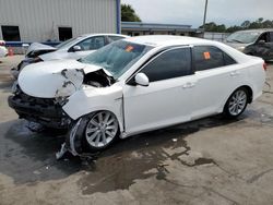 Salvage cars for sale from Copart Orlando, FL: 2012 Toyota Camry Hybrid