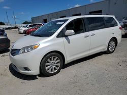 Salvage cars for sale at Jacksonville, FL auction: 2014 Toyota Sienna XLE
