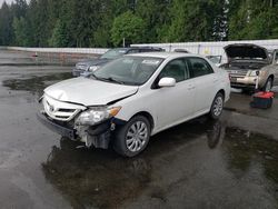 Salvage cars for sale from Copart Arlington, WA: 2012 Toyota Corolla Base