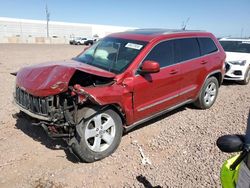 SUV salvage a la venta en subasta: 2011 Jeep Grand Cherokee Laredo