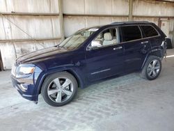 Salvage SUVs for sale at auction: 2014 Jeep Grand Cherokee Overland