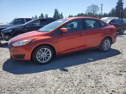 Salvage cars for sale from Copart Graham, WA: 2018 Ford Focus SE