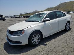 Volkswagen salvage cars for sale: 2011 Volkswagen Jetta SE