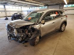 Salvage SUVs for sale at auction: 2013 Mazda CX-5 Touring