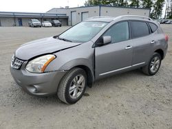 Salvage cars for sale from Copart Arlington, WA: 2013 Nissan Rogue S