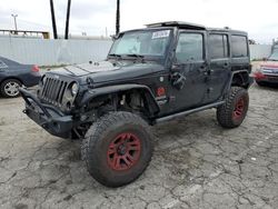 Salvage cars for sale from Copart Van Nuys, CA: 2015 Jeep Wrangler Unlimited Sport