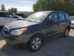 Salvage cars for sale from Copart Arlington, WA: 2014 Subaru Forester 2.5I
