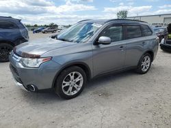 Salvage cars for sale from Copart Kansas City, KS: 2015 Mitsubishi Outlander SE