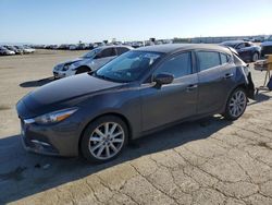 Mazda salvage cars for sale: 2017 Mazda 3 Grand Touring