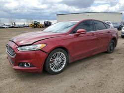 Salvage cars for sale from Copart Rocky View County, AB: 2016 Ford Fusion SE
