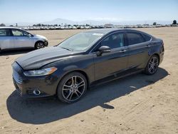 Salvage cars for sale at Bakersfield, CA auction: 2013 Ford Fusion Titanium