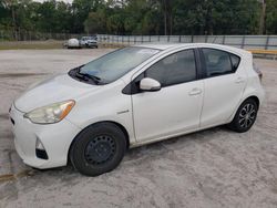 Salvage cars for sale from Copart Fort Pierce, FL: 2012 Toyota Prius C