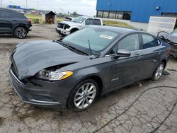 Salvage cars for sale from Copart Woodhaven, MI: 2017 Ford Fusion SE Hybrid