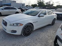 Salvage cars for sale from Copart Opa Locka, FL: 2011 Jaguar XJL