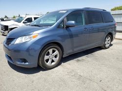 Salvage cars for sale from Copart Bakersfield, CA: 2014 Toyota Sienna LE
